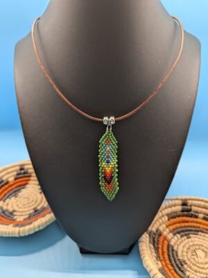Juniper Mesa , Hand beaded feather necklace, Juniper Mesa, layered greens with warm orange and magenta accents, sterling silver accents on leather.